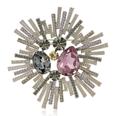 Purple starburst crystal gem brooch front on white