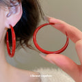 Red Coated Hoop Stud Earrings In Three Graduated Sizes view 3
