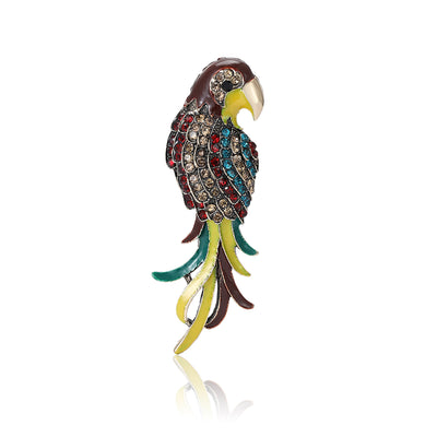 Front product view of the colorful crystal parrot brooch on a light background