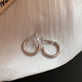 Polished Metal Teardrop Hoop Earrings in Six Size and Color Options view 10