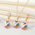 Gold Tone Glitter Unicorn Pendant Necklace and Huggie Earrings view 1