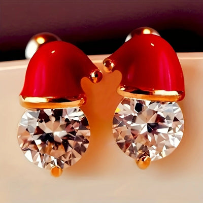 Gold red Christmas hat clear CZ stud earrings pair on beige stand
