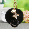 Jeweled Clover Medallion Keychains with Black and White Faux Fur Poms view 2