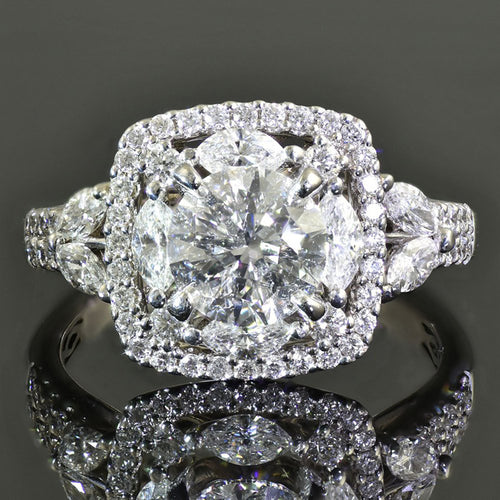 Product view of silver tone round crystal cushion halo ring statement jewelry