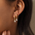 Gold Huggie Hoop Earrings Teardrop CZ Drop Dangle Pair view 1