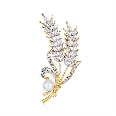 Front product view of the wheat brooch pin in gold and silver