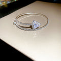 Clear Crystal Bow Center Open Cuff In Gold Or Silver Tone view 6