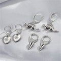 Silver Tone Cone Spike and Dinosaur Huggie Drop Earrings view 1