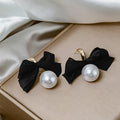 Black Fabric Bow and White Pearl Look Drop Earrings view 2