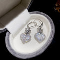 Silver Tone Crystal Heart Drop Huggie Earrings With Crown Detail view 6