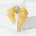 Gold Tone Layered Angel Wing Brooch With Crystal Center view 1