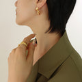 Fan Embossed Twist Stud Earrings Gold Steel Tone Pair view 3