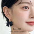 Gold-Tone Pave Huggie Black Matte Bow Drop Earrings view 2