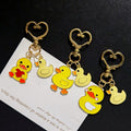 Yellow Duck Pair Heart-Clasp Charms in Three Designs view 3