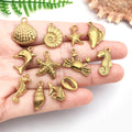 Gold-Tone Shell and Starfish Shell Charms with 15 Listed Options view 2