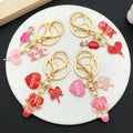 Twelve Pink and Red Love Heart Metal Keychain Designs view 3