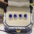 Royal Blue Oval Halo Stud Earrings Clear Stone Border view 2