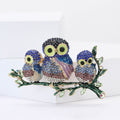 Three Owl Crystal Brooch on Leafy Branch in Two Palettes view 2