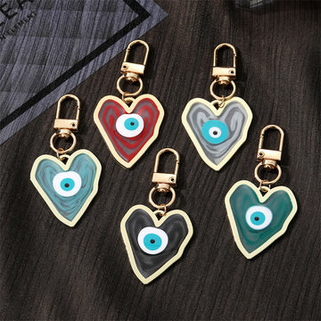 Gold Tone Swirled Heart Evil Eye Clip Keychains in Five Colors