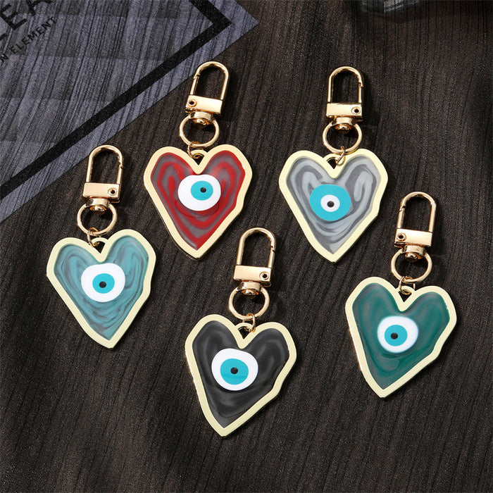 Gold Tone Swirled Heart Evil Eye Clip Keychains in Five Colors