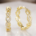 Crystal Set Wavy Hoop Earrings in Silver and Gold Tones view 2
