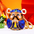 Jeweled Wealth Deity Keychain with Red Enamel and Gold Tone Trim view 3