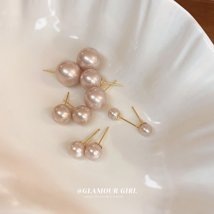 Pink Pearl Stud Earrings with Gold Tone Posts with Polished Metal Accents