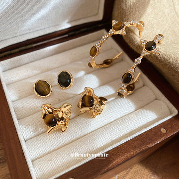Gold Tone Ripple Earrings With Brown Stone Accents In Two Styles