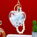 Clear Heart Preserved Flower Keychains with Pearl Loops in Six Colors view 10