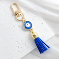 Gold Tone Evil Eye Charm Keychain with Blue Tassel and Rhinestone Accents view 12