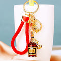 Jeweled Wine Bottle Keychains in Three Red and Braided Loop Configurations view 2