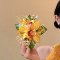 Fabric Orchid Duckbill Hair Clips in Red and Yellow view 3