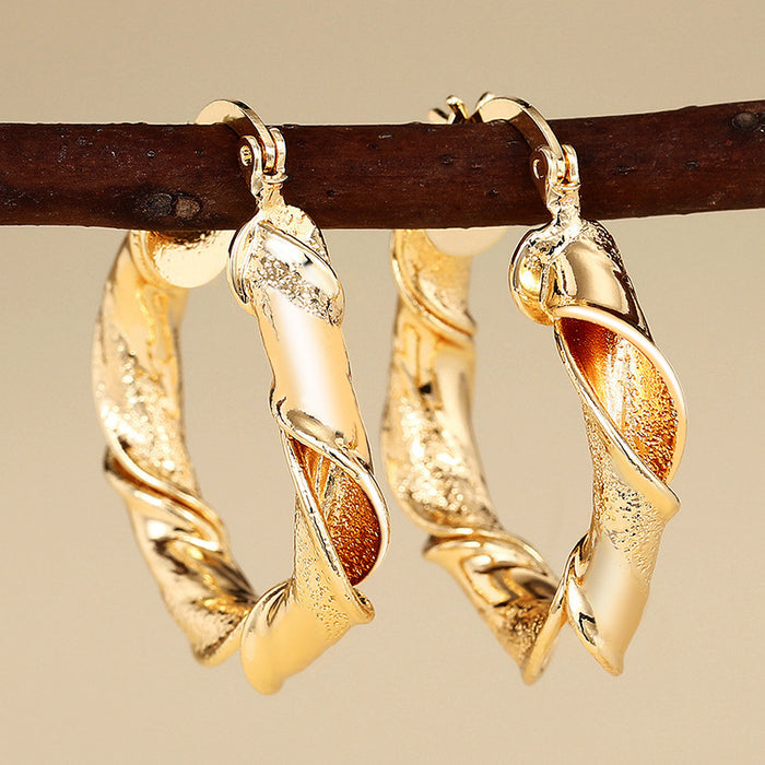 Twisted Cutout Hoop Earrings in Gold-Tone Metal Jewelry