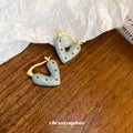 Polka Dot Heart Huggie Hoop Earrings in Brown and Blue view 4
