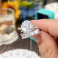 Oval Halo Stone and Tapered Baguette Band Ring Set view 3