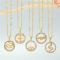 Gold Tone Round Crystal Framed Motif Pendant Necklaces in Nine Designs view 1