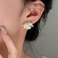 Silver Tone Radiating Floral Crystal Burst Stud Earrings view 1