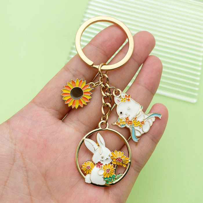 Easter Bunny Charm Keychains Featuring White Easter Bunny Across 19 Pictured Variations