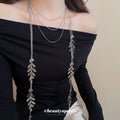 Silver Tone Layered Leaf Tassel Necklace With Decorative Metal Details view 3