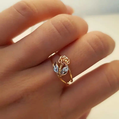 Two-tone rose flower leaf open ring worn on hand close-up