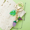 Strawberry, Cherry and Lemon Charm Keychains Featuring Purple Grape Across 43 Variations view 4
