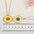 Gold Tone Round Pressed Daisy Resin Pendant Necklaces in Two Colors view 2