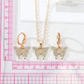 Gold Tone Crystal Butterfly Necklace and Huggie Earrings view 4