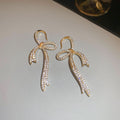 Crystal Bow Hook Earrings in Gold Tone or Silver Tone view 6