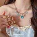 Gold Tone Ocean Charm and Flower Chain Necklaces Statement Jewelry view 1