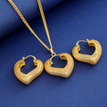 Gold Tone Gold Heart Loop Metal Necklace and Earring Set view 2