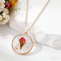 Gold Tone Round Pressed Flower Pendant Necklaces in Fourteen Designs view 10
