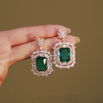 Product view showing green or aqua rectangular floral cluster drop earrings two tone