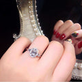 Silver Tone Oval Halo Ring With Clear Side Stones Polished Jewelry view 4
