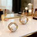 Pearl Geometric Stud Earrings in Gold Tone Polished Metal Jewelry view 1